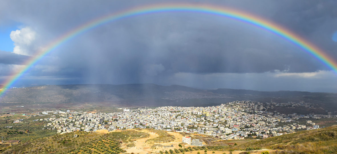 rainbow over Cana of Galilee after rain, Israel