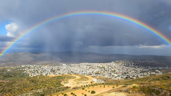 rainbow over Cana of Galilee after rain, Israel