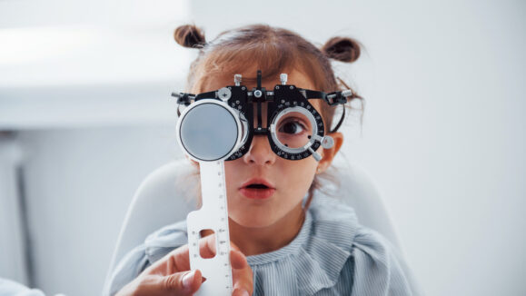 Little,Girl,In,Eyewear,In,Ophthalmology,Clinic,Have,Test,Of