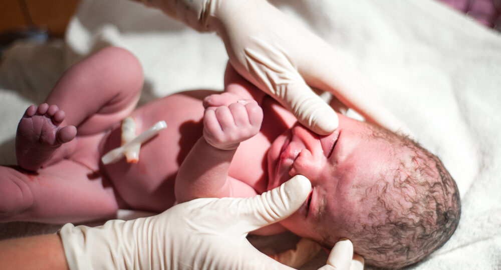 Newborn,Baby,Is,Crying,At,His,First,Check,Up