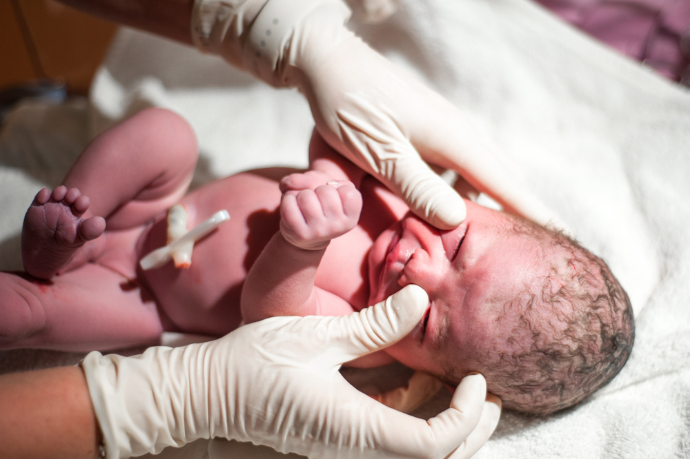 Newborn,Baby,Is,Crying,At,His,First,Check,Up