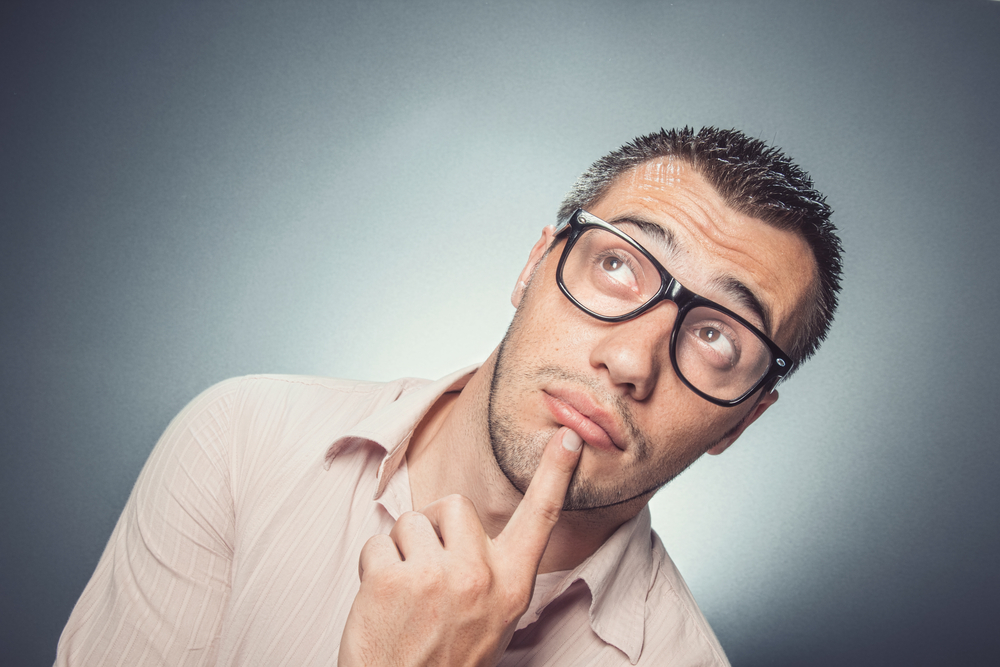 Worried,Young,Businessman,Looking,Up.,Confused,Man,With,Eyewear,Thinking