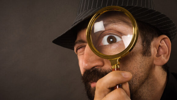 The,Curious,Detective,Is,Looking,With,Magnifier,Or,Magnifying,Glass