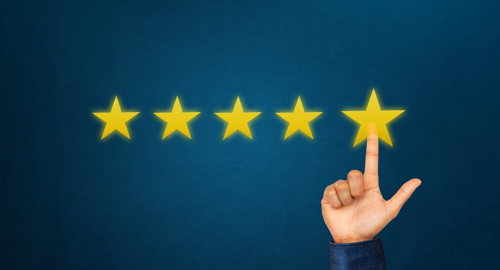 Hand,Of,Client,Giving,A,Five,Star,Rating.,Service,Rating,