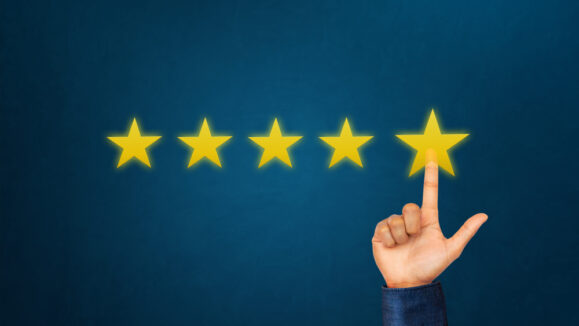 Hand,Of,Client,Giving,A,Five,Star,Rating.,Service,Rating,