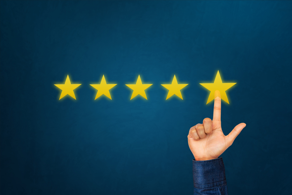 Hand,Of,Client,Giving,A,Five,Star,Rating.,Service,Rating,