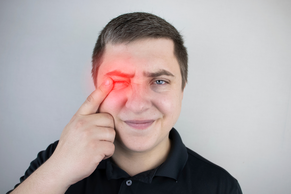 A,Man,Suffers,From,Pain,In,The,Eye.,Patient,With